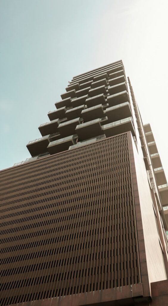 a tall building with a sky background