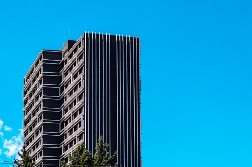 a tall building with a clock on the side of it